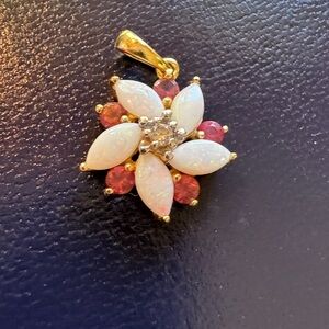 Very pretty with tiny diamond